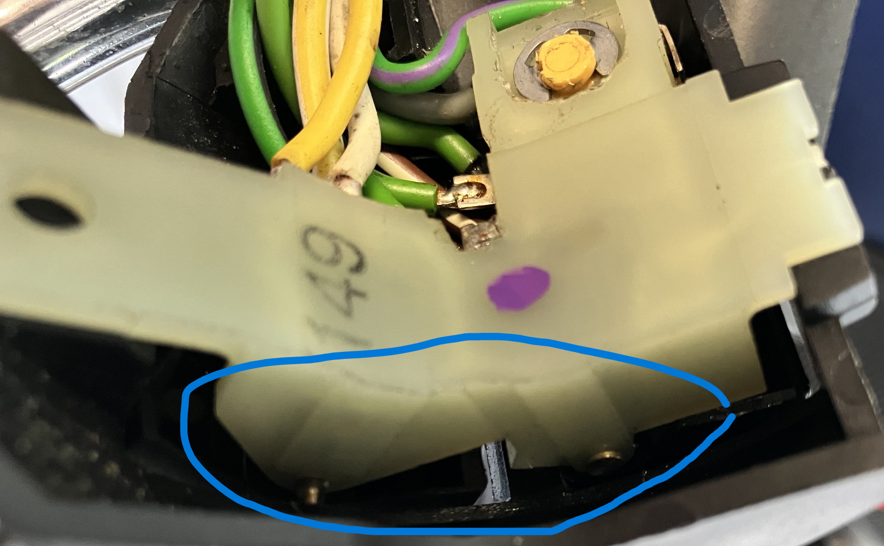 brass pin holding switch in place?